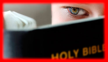 Image of the eye of a child reading a HOLY BIBLE